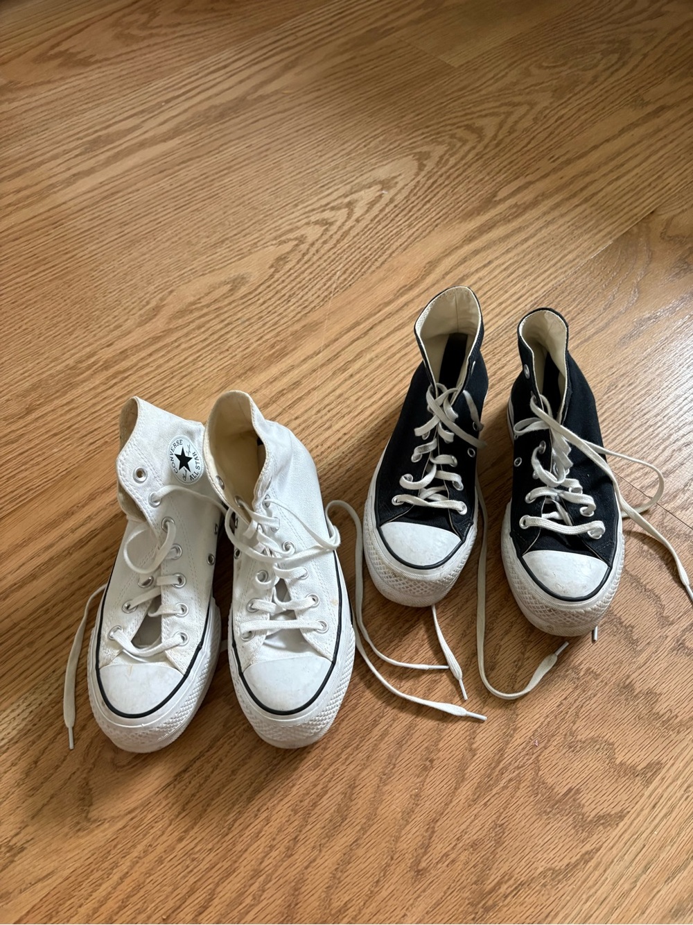 2 pairs of high top platform converse